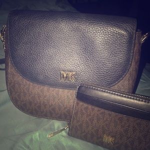 Small Authentic MK purse and matching wallet.